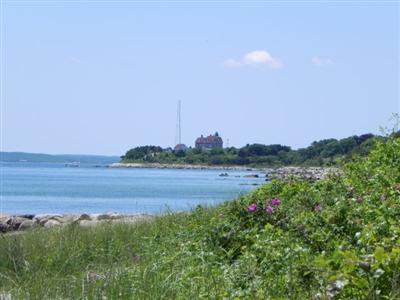 16 F R Lillie Road Woods Hole, MA 02543 - Photo 4 of 19 a view of a lake with a city