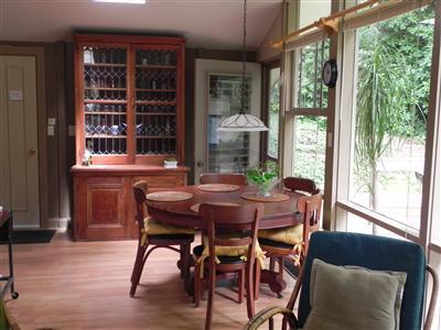 16 F R Lillie Road Woods Hole, MA 02543 - Photo 5 of 19 a view of a dining room with furniture window and outside view