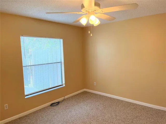 a view of a chandelier fan and a chandelier fan