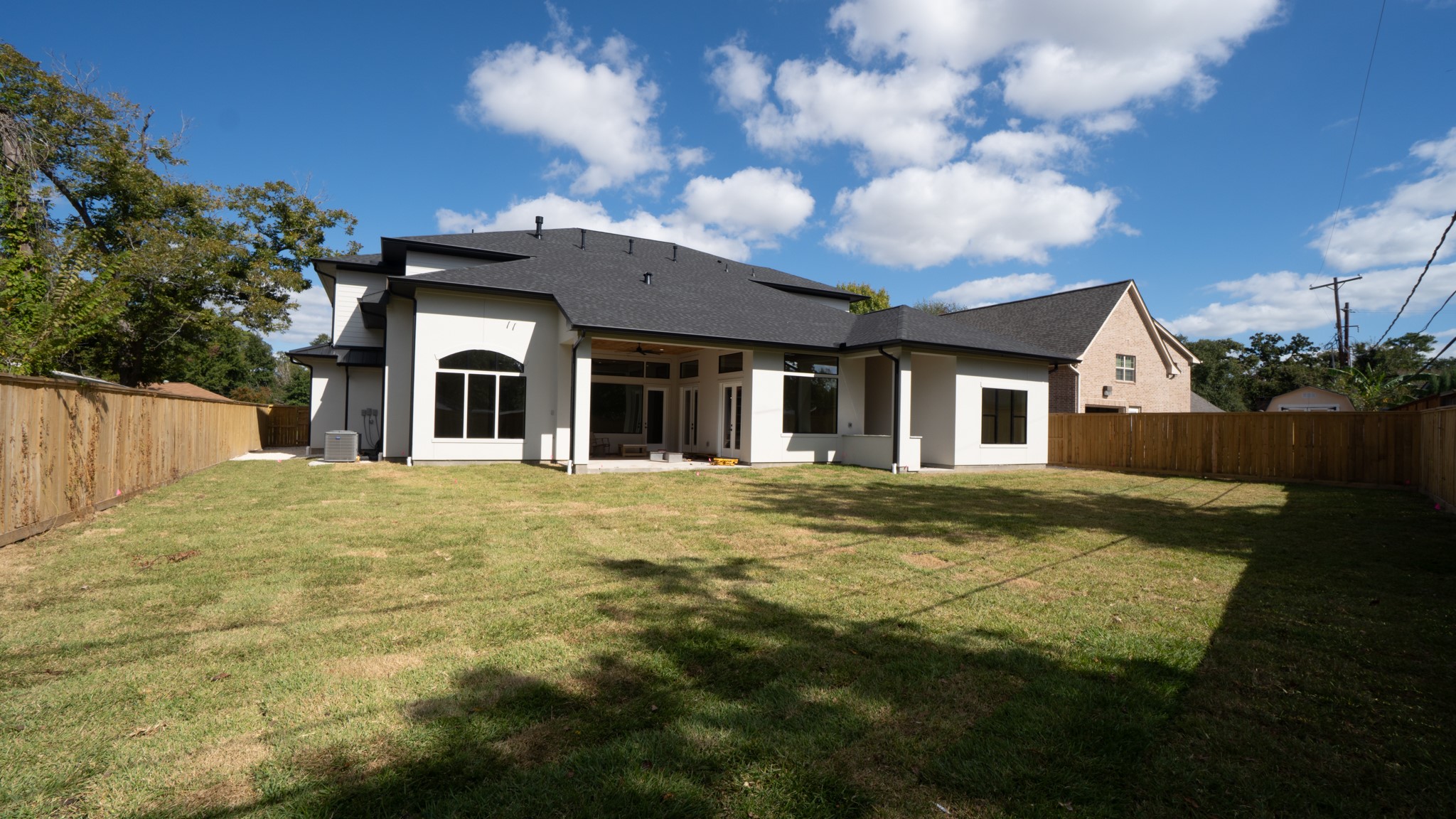 9345 Leto Road Houston, TX 77080 - Photo 22 of 22 a view of a house with backyard and garden