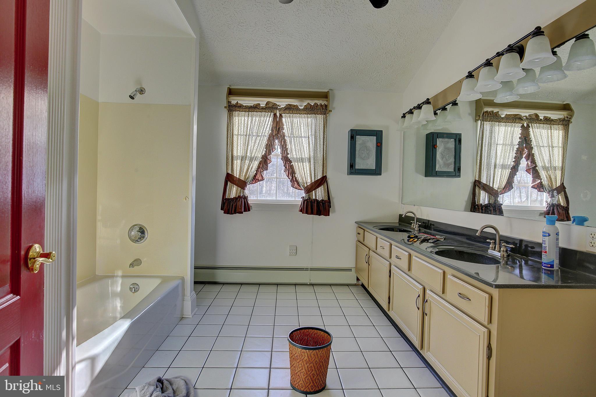 241 Earth Station Road Catawissa, PA 17820 - Photo 16 of 18 a kitchen with a refrigerator and a stove
