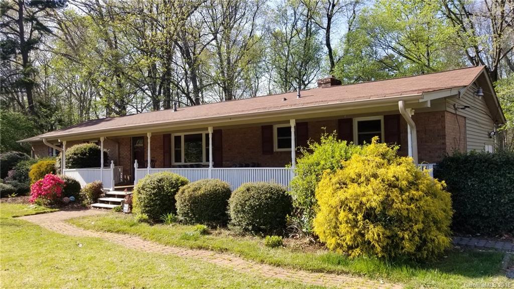 7045 Ridge Lane Road Charlotte, NC 28262 - Photo 2 of 19 a view of a house with a yard