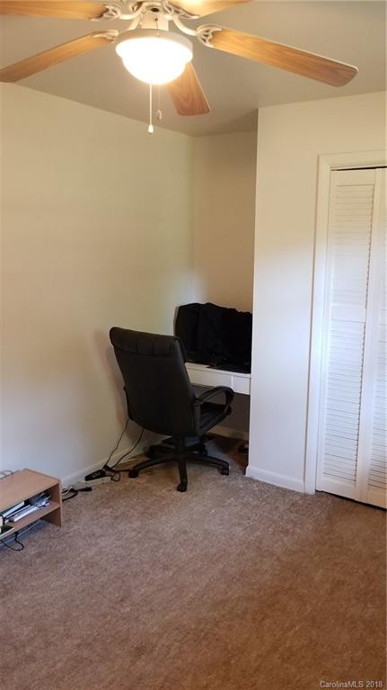 7045 Ridge Lane Road Charlotte, NC 28262 - Photo 14 of 19 a room with a table and chairs