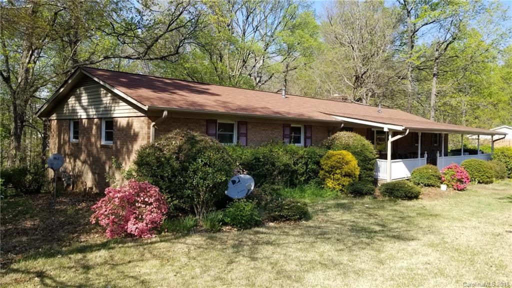 7045 Ridge Lane Road Charlotte, NC 28262 - Photo 4 of 19 a front view of a house with garden