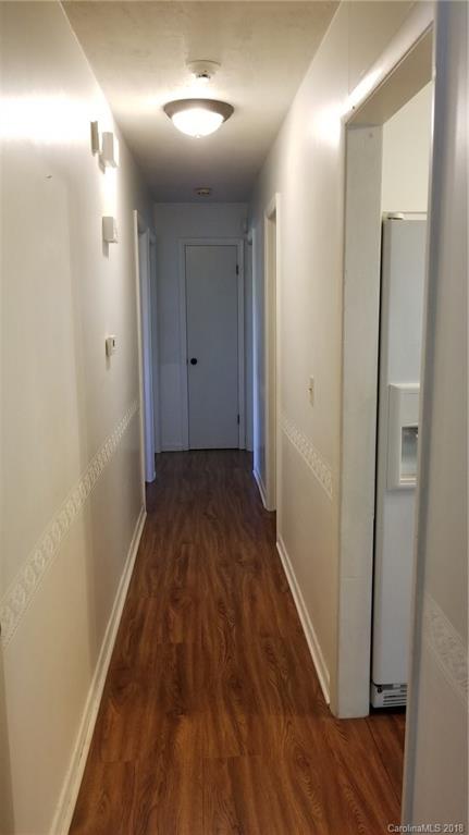 7045 Ridge Lane Road Charlotte, NC 28262 - Photo 9 of 19 a view of a hallway with wooden floor