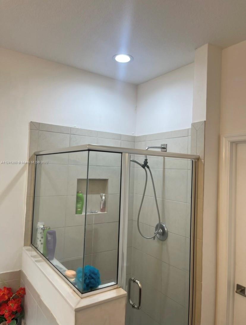 28281 Southwest 128th Place Homestead, FL 33033 - Photo 23 of 39 a bathroom with a shower