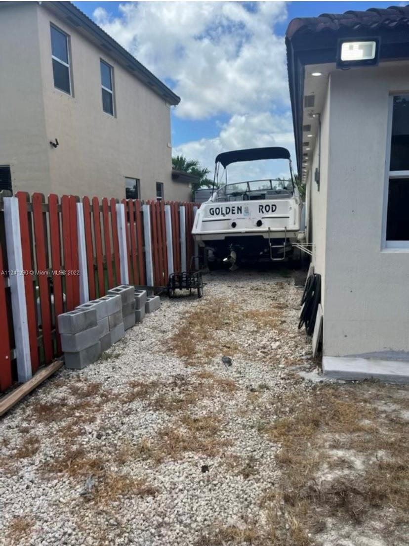 28281 Southwest 128th Place Homestead, FL 33033 - Photo 28 of 39 a view of a backyard of a house