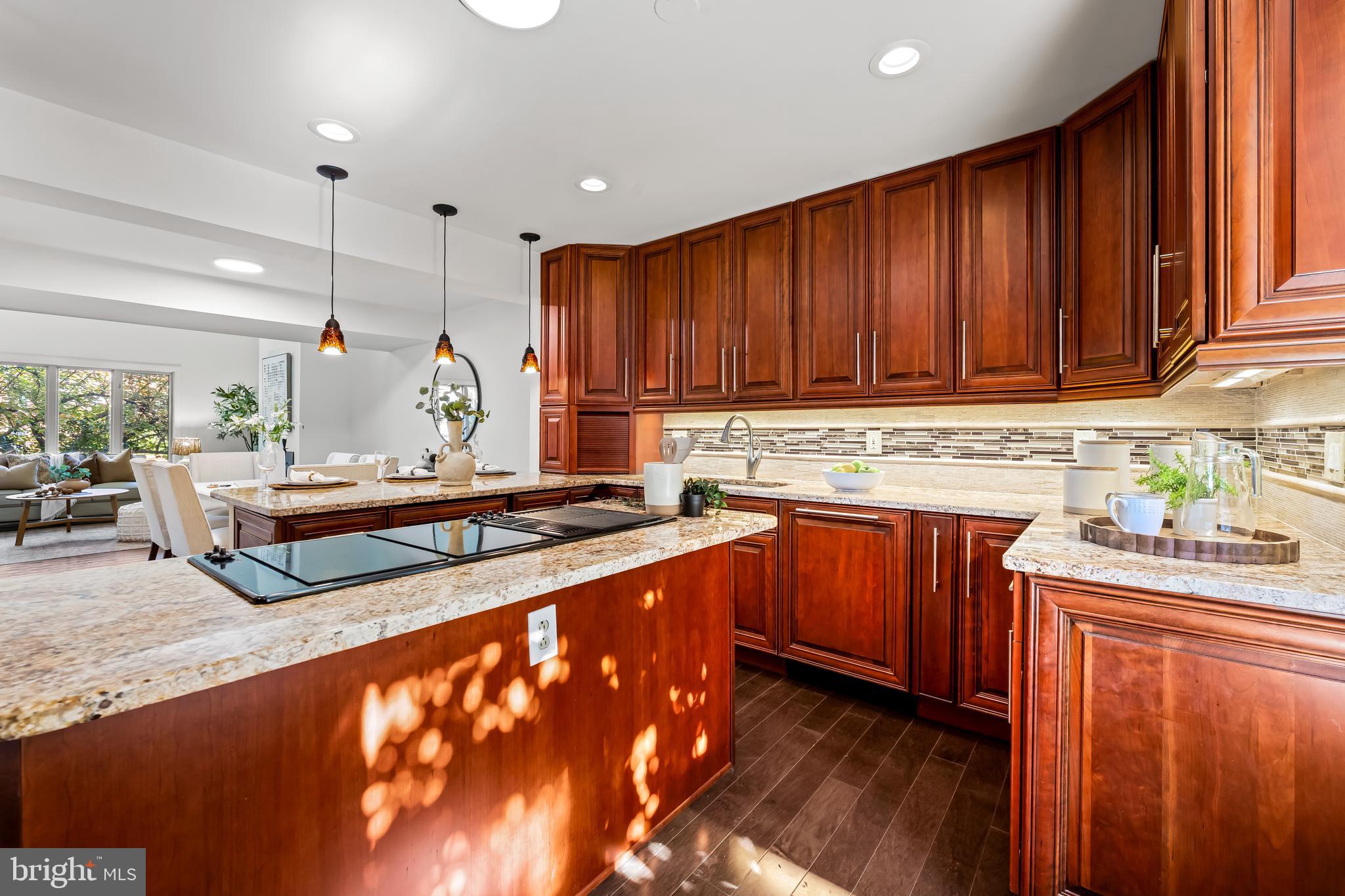 254 Waxter Way Baltimore, MD 21217 - Photo 9 of 44 a kitchen with sink refrigerator and cabinets
