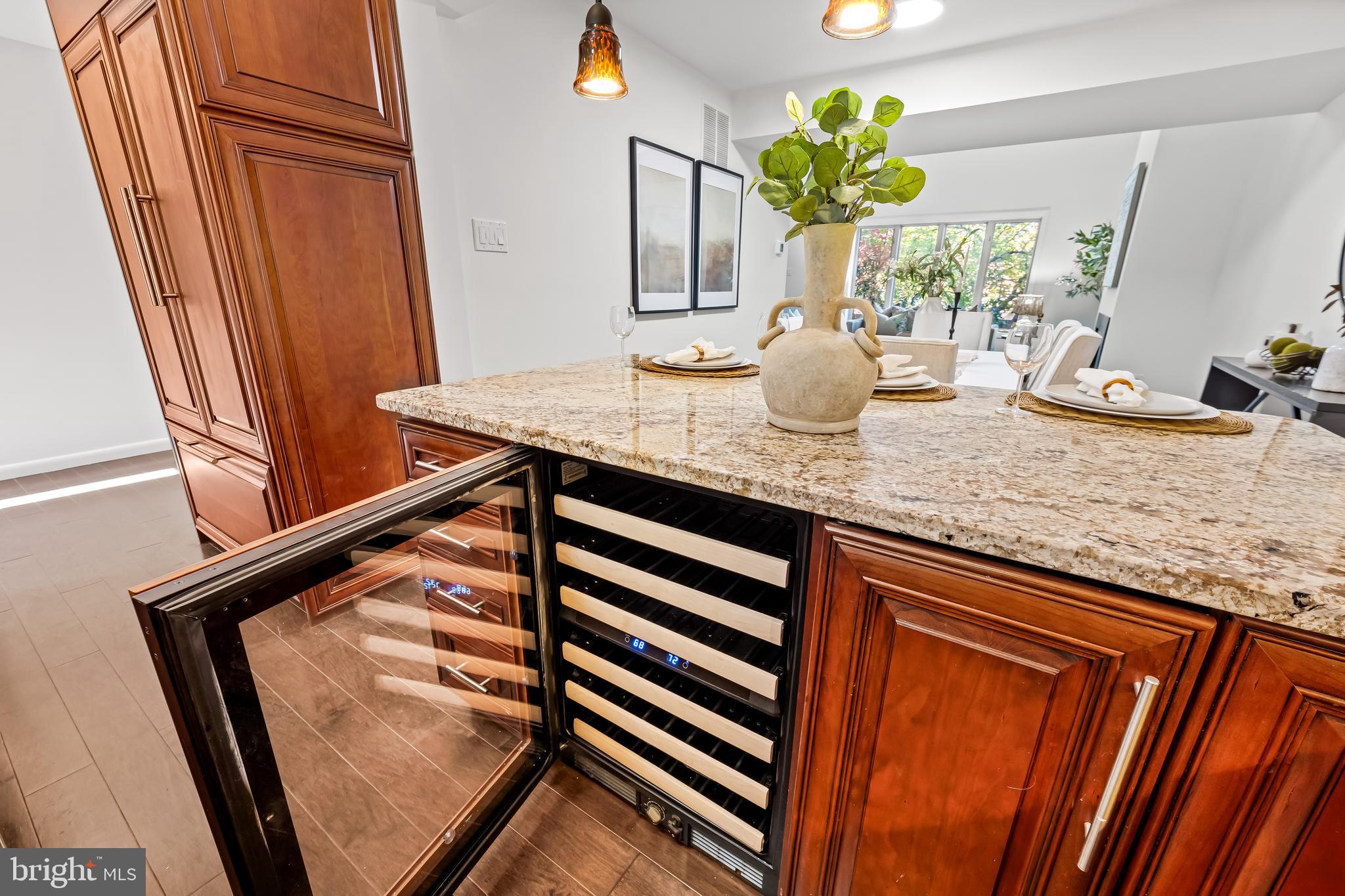 254 Waxter Way Baltimore, MD 21217 - Photo 14 of 44 a bathroom with a granite countertop sink a toilet and a mirror