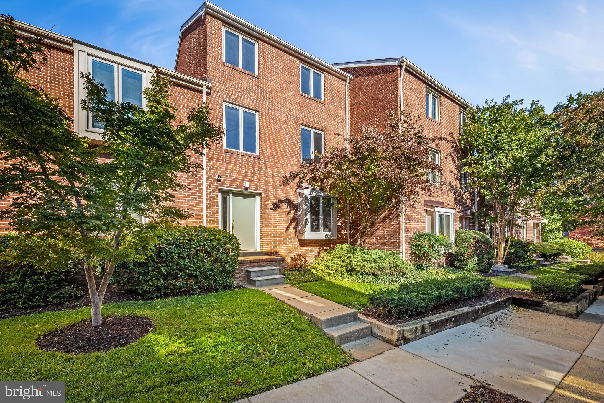 254 Waxter Way Baltimore, MD 21217 - Photo 2 of 44 a front view of a house with garden