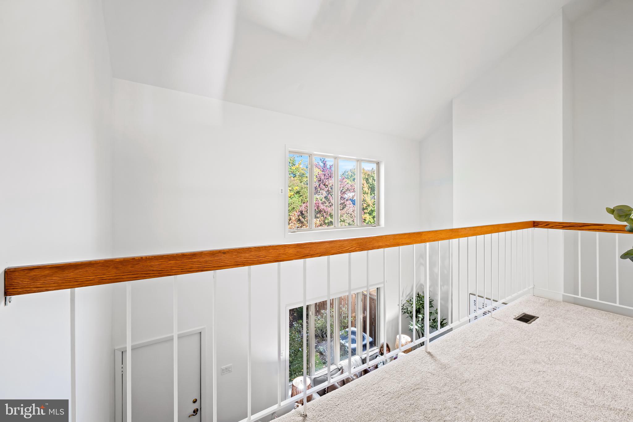 254 Waxter Way Baltimore, MD 21217 - Photo 19 of 44 a view of a hallway with stairs