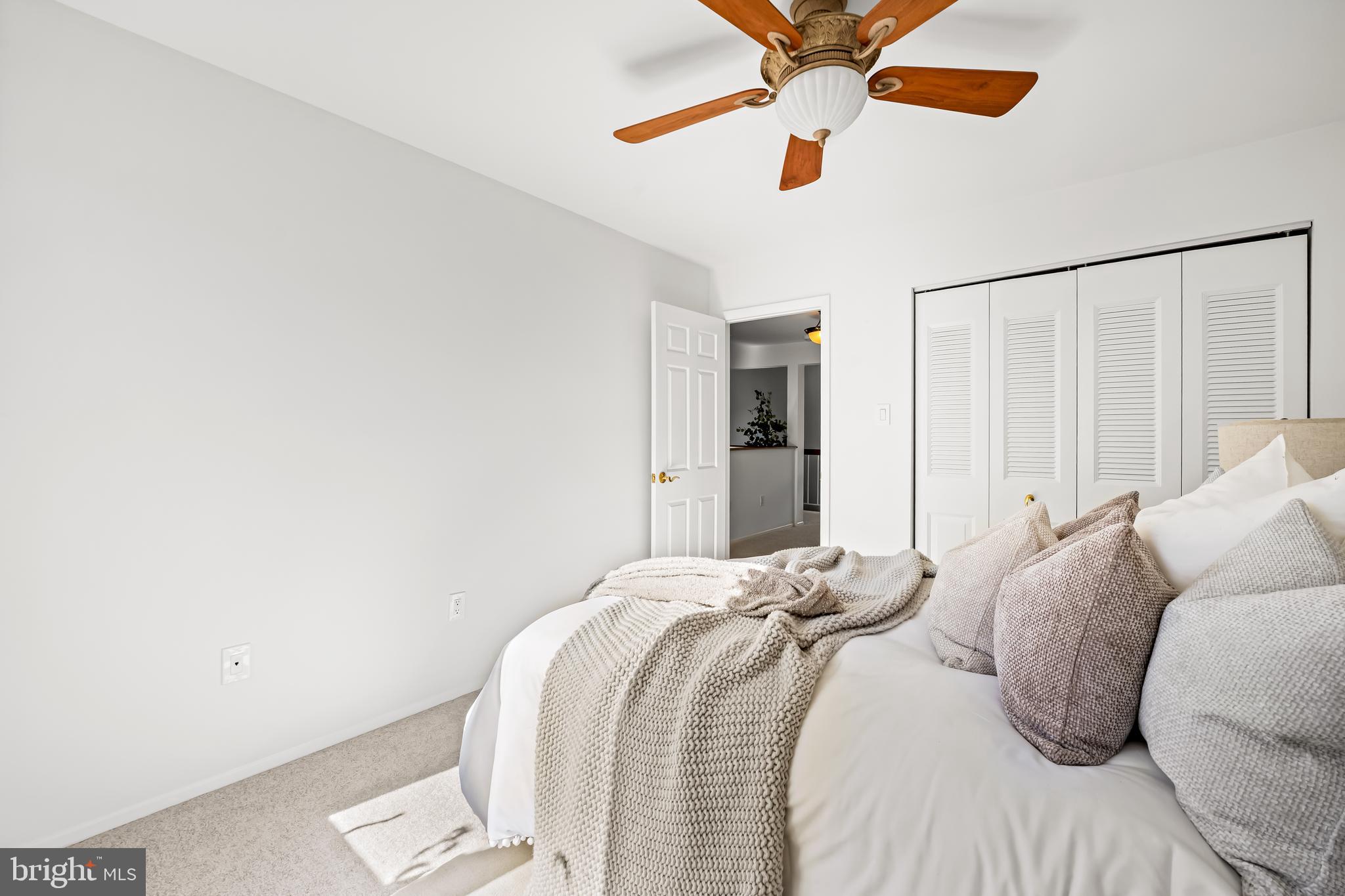 254 Waxter Way Baltimore, MD 21217 - Photo 20 of 44 a bedroom with a bed and a chandelier