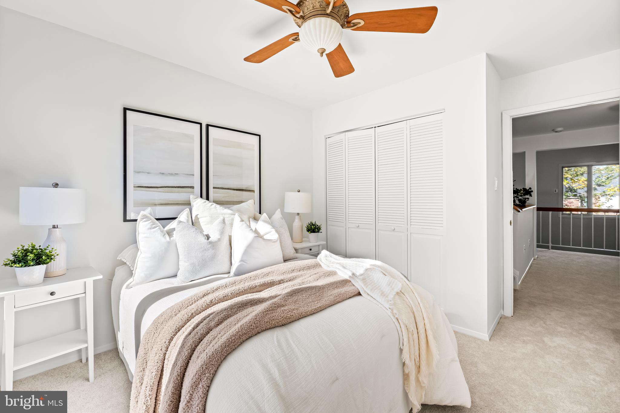 254 Waxter Way Baltimore, MD 21217 - Photo 22 of 44 a bedroom with a bed and a chandelier