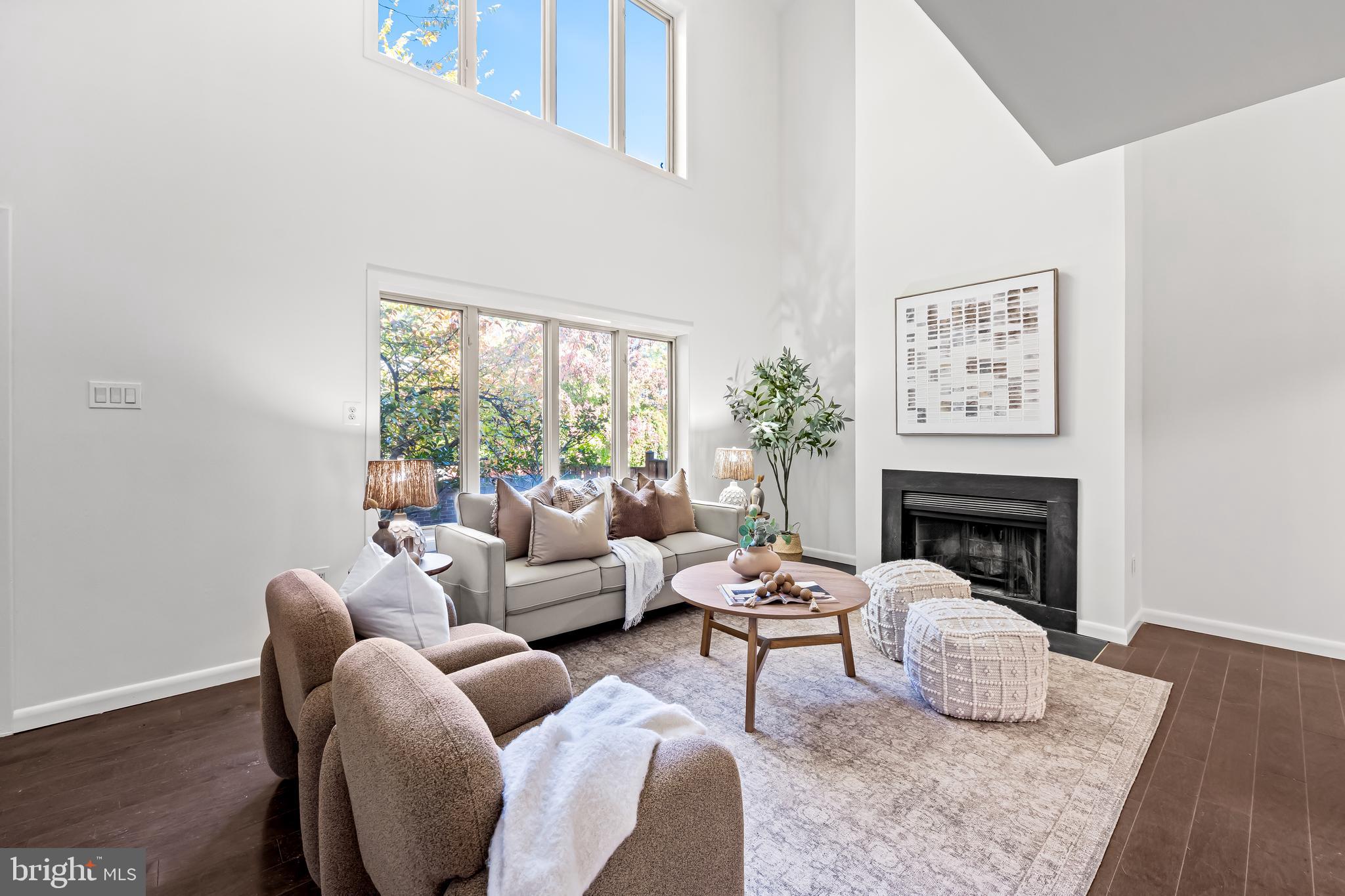 254 Waxter Way Baltimore, MD 21217 - Photo 6 of 44 a living room with furniture and a fireplace