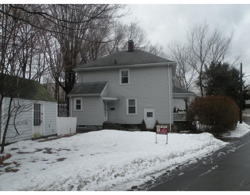 29 Davenport Road Needham, MA 02494 - Photo 3 of 3 a view of a house with a yard covered in snow