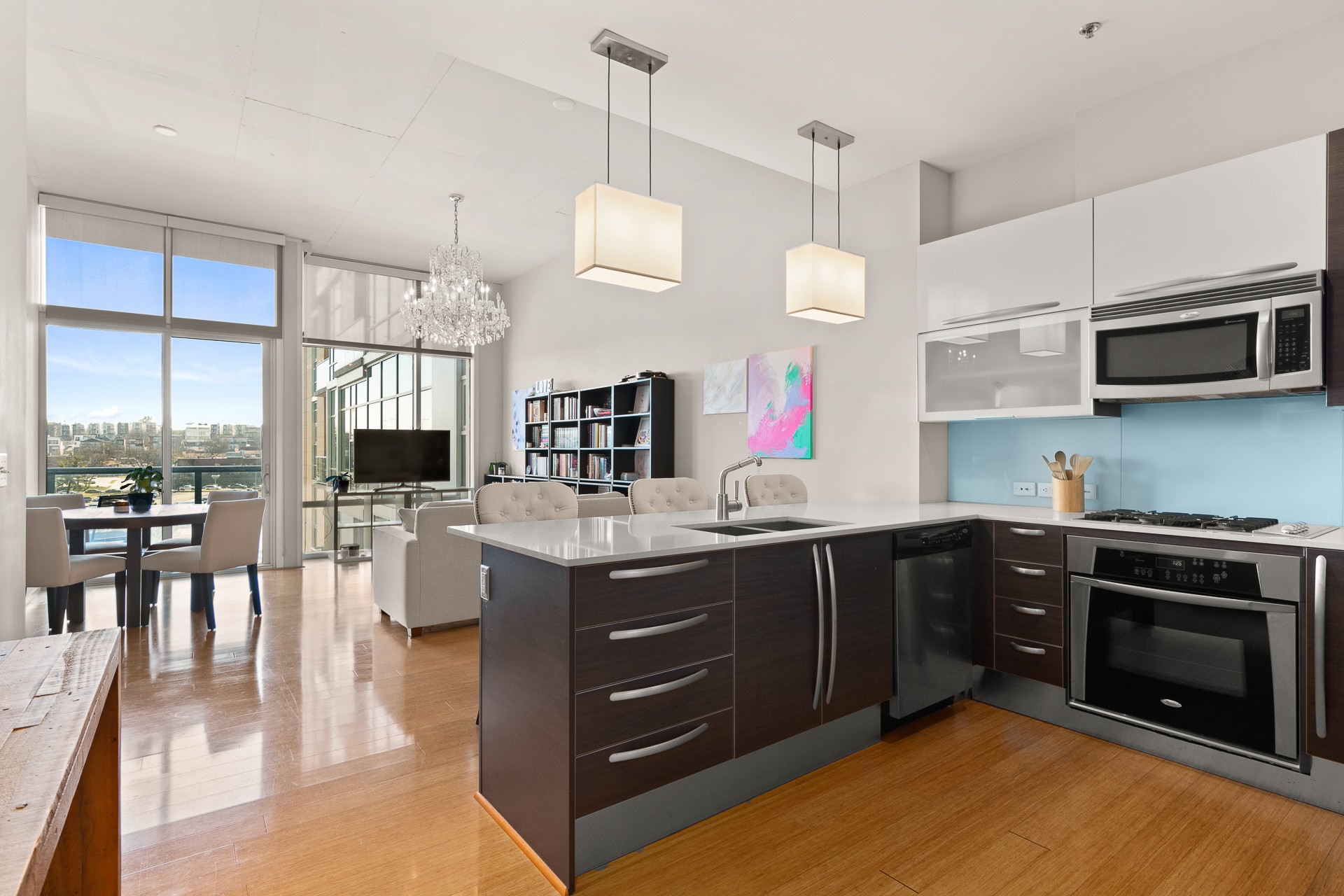 a kitchen with lots of counter space and appliances