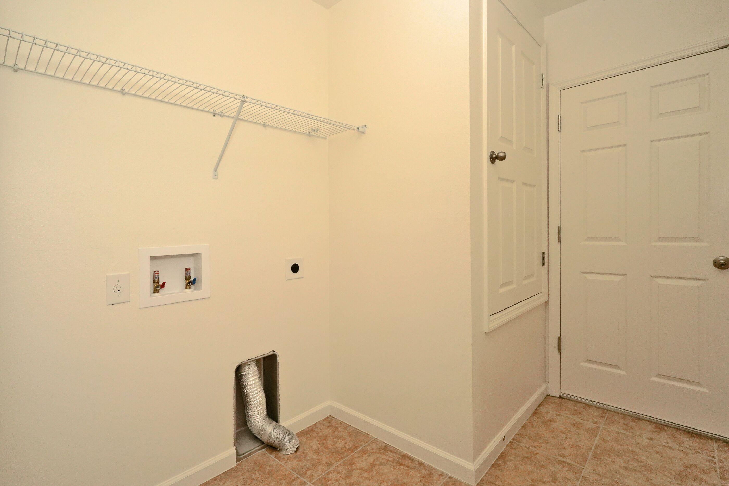 740 Fiddleleaf Circle Melbourne, FL 32904 - Photo 15 of 22 Laundry Room