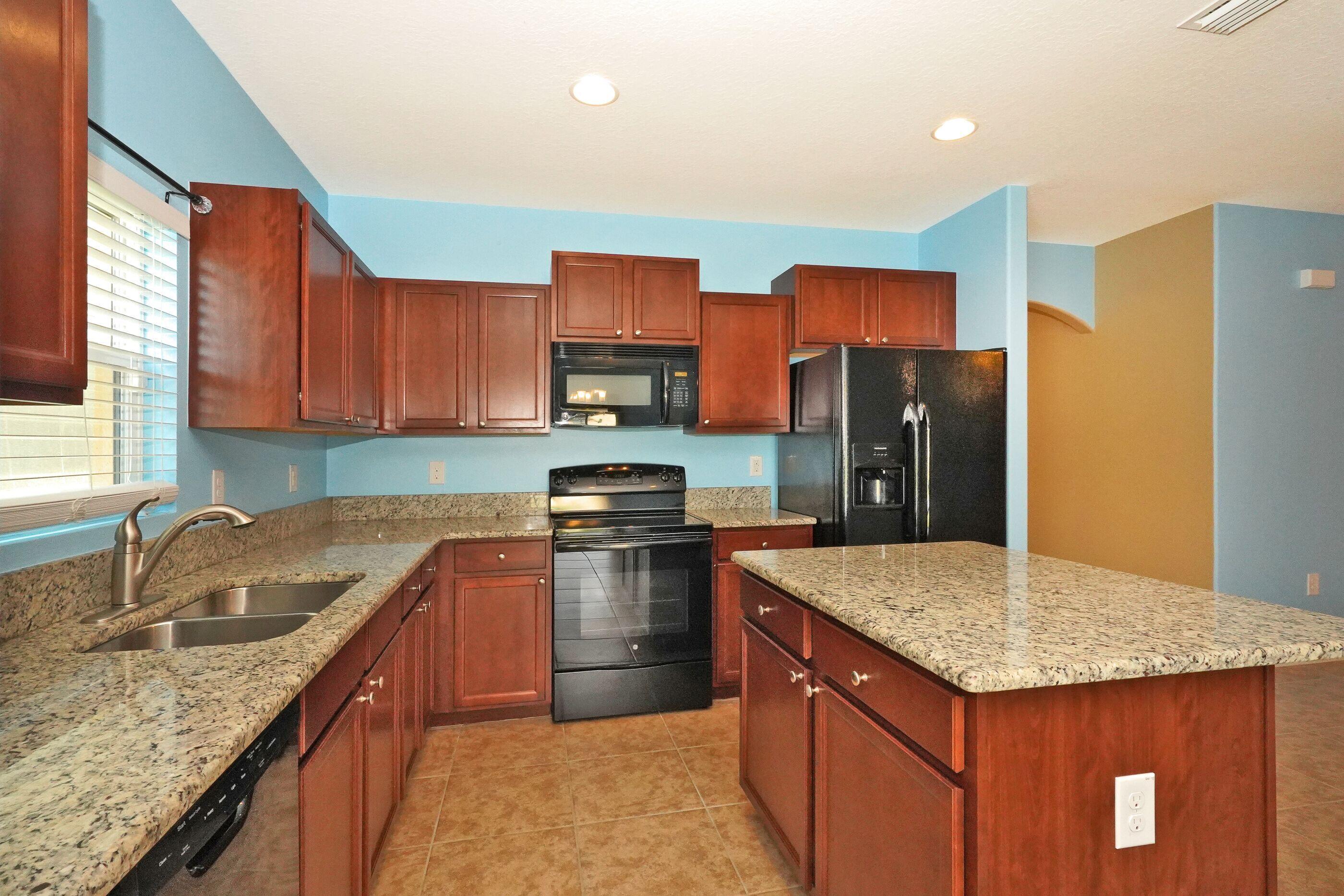 740 Fiddleleaf Circle Melbourne, FL 32904 - Photo 4 of 22 Kitchen 2