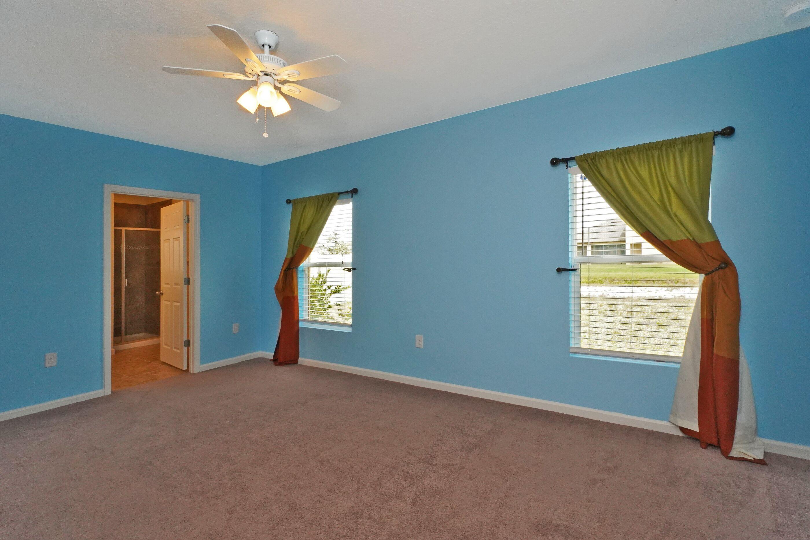 740 Fiddleleaf Circle Melbourne, FL 32904 - Photo 8 of 22 Master Bedroom