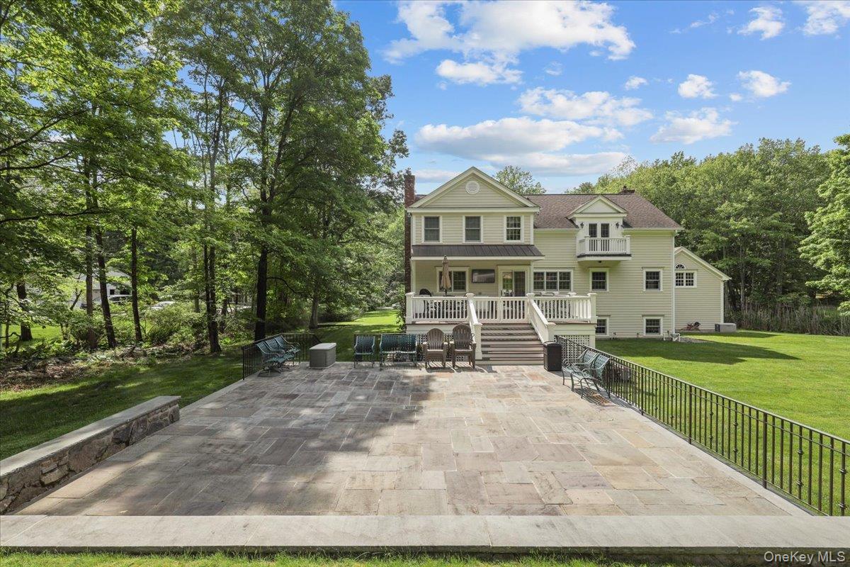 135 Pines Bridge Road Katonah, NY 10536 - Photo 37 of 40 a view of a house with a yard