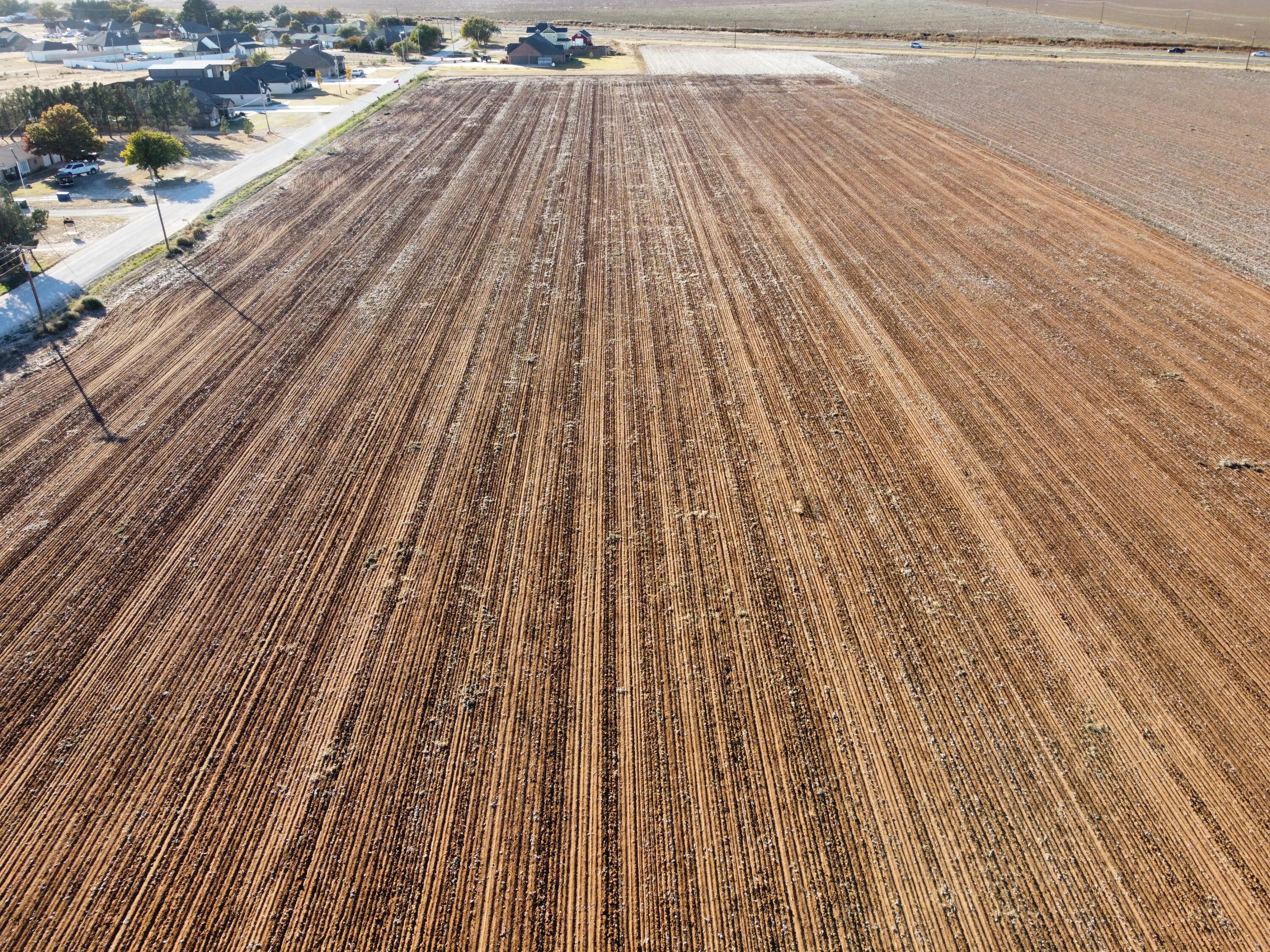 6623 Tiger Road Ropesville, TX 79358 - Photo 2 of 6 a view of outdoor space with wooden floor and yard