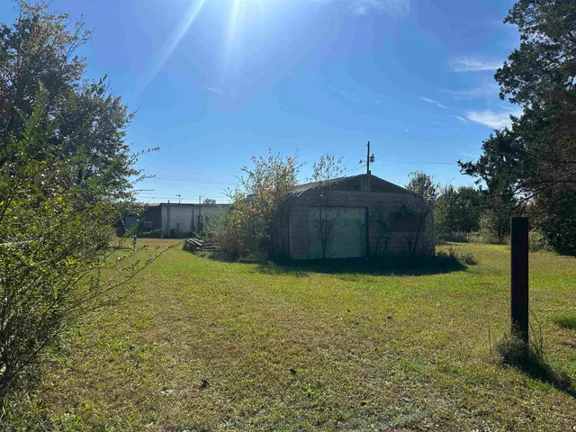 a store room with lots of different colored cloths