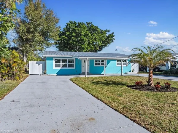 front view of a house with a yard
