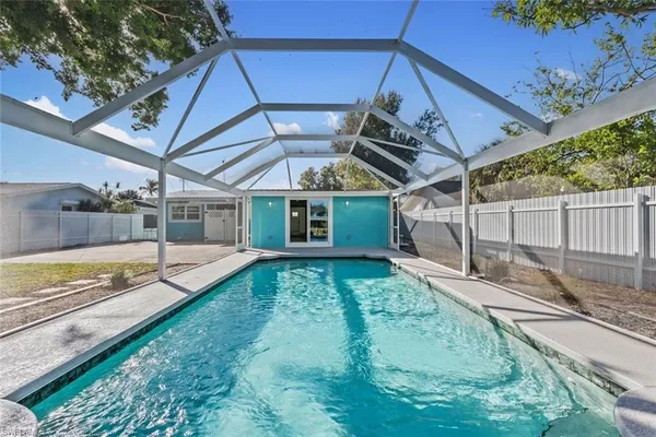 a view of a backyard with a patio
