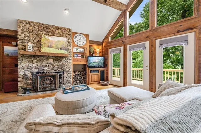 a bedroom with furniture and a fireplace