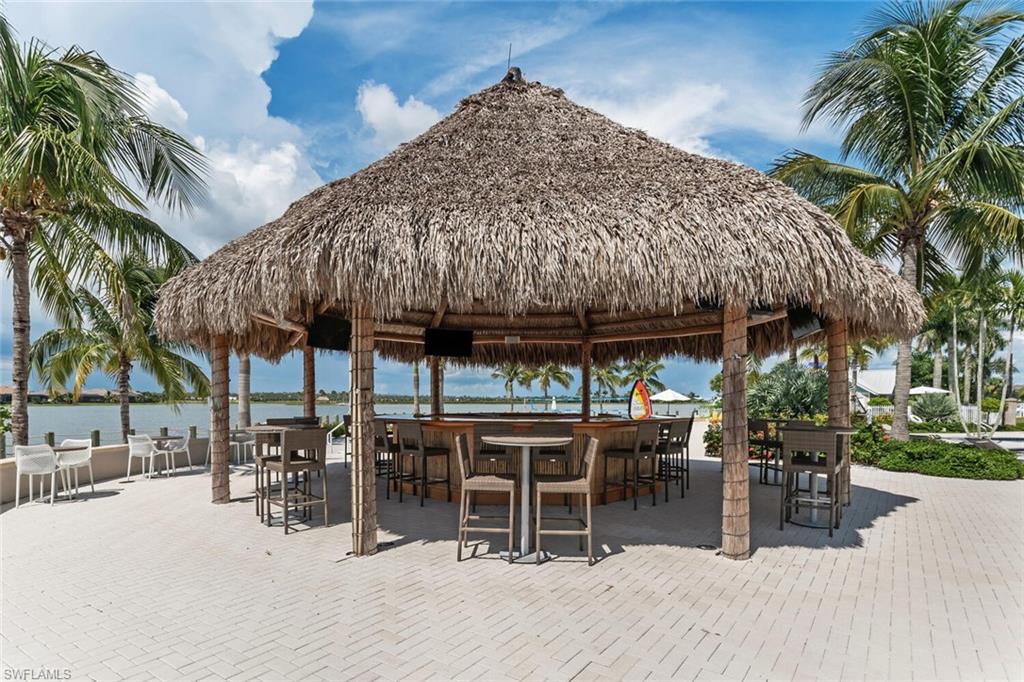 14940 Edgewater Circle Naples, FL 34114 - Photo 34 of 39 a view of outdoor space yard and patio