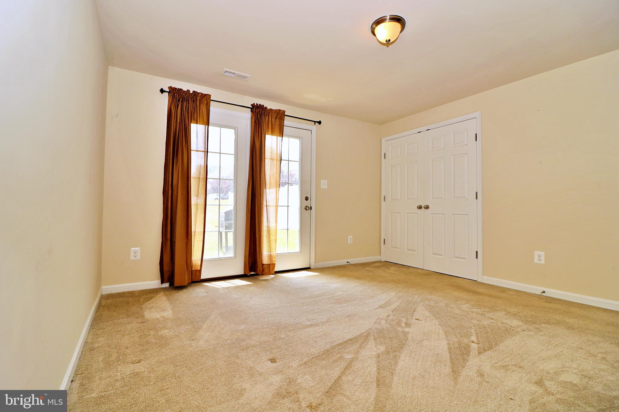 18 Baltic Lane Ranson, WV 25438 - Photo 2 of 24 Finished Basement
