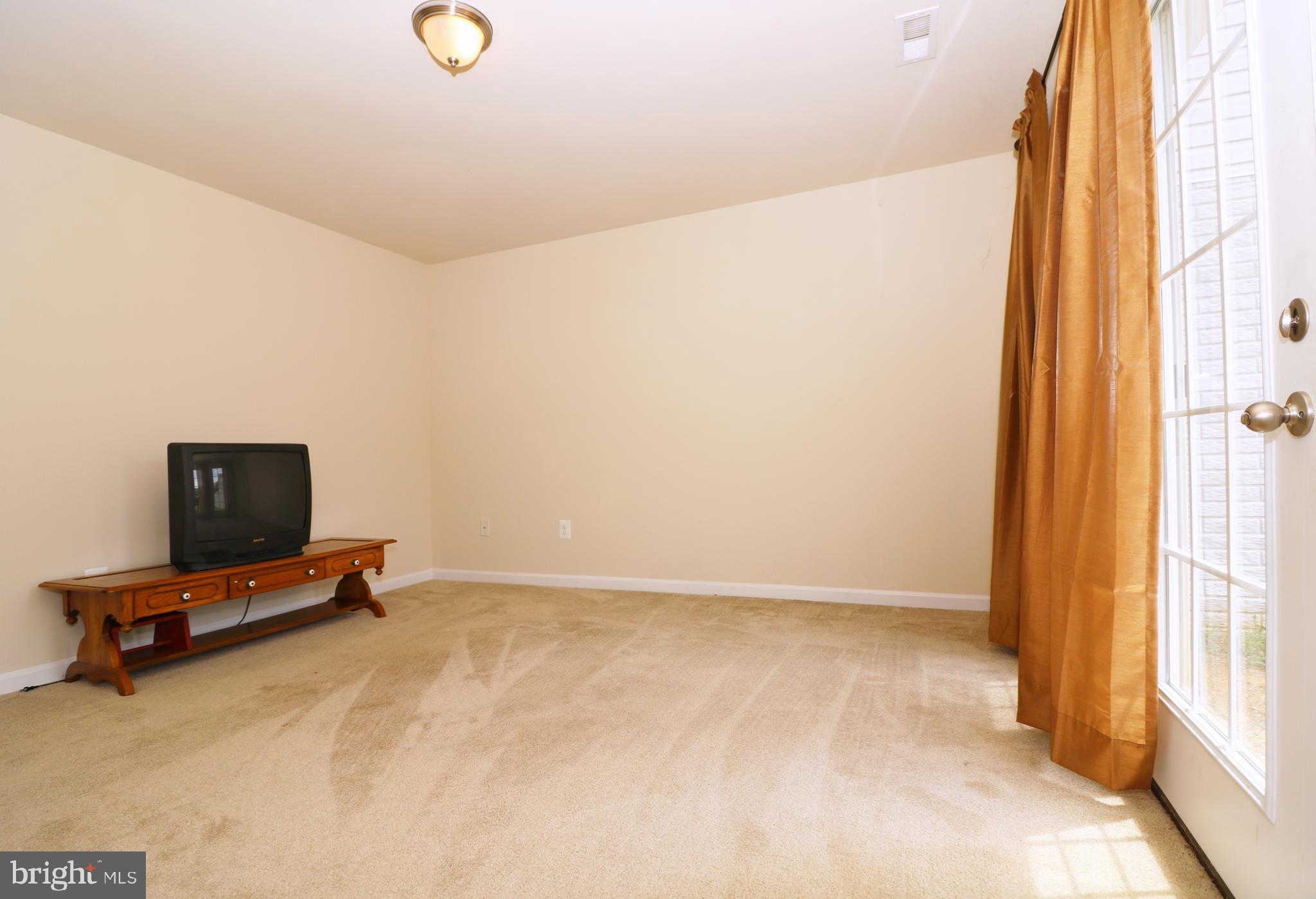 18 Baltic Lane Ranson, WV 25438 - Photo 4 of 24 Finished Basement