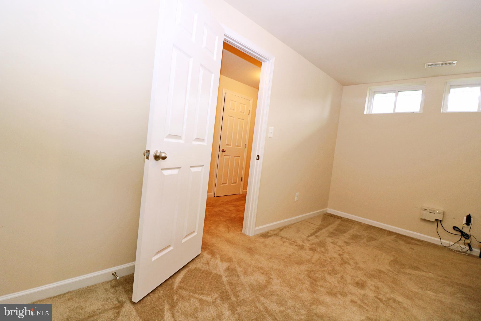 18 Baltic Lane Ranson, WV 25438 - Photo 5 of 24 Finished Basement