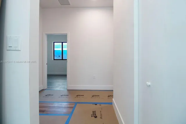 a view of walk in closet with window