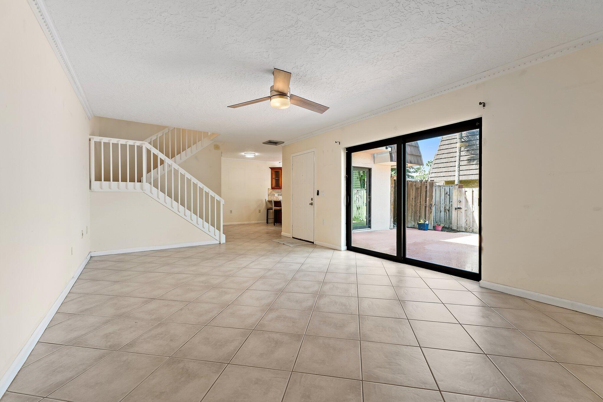 1514 15th Court Jupiter, FL 33477 - Photo 7 of 25 a view of an empty room with a window
