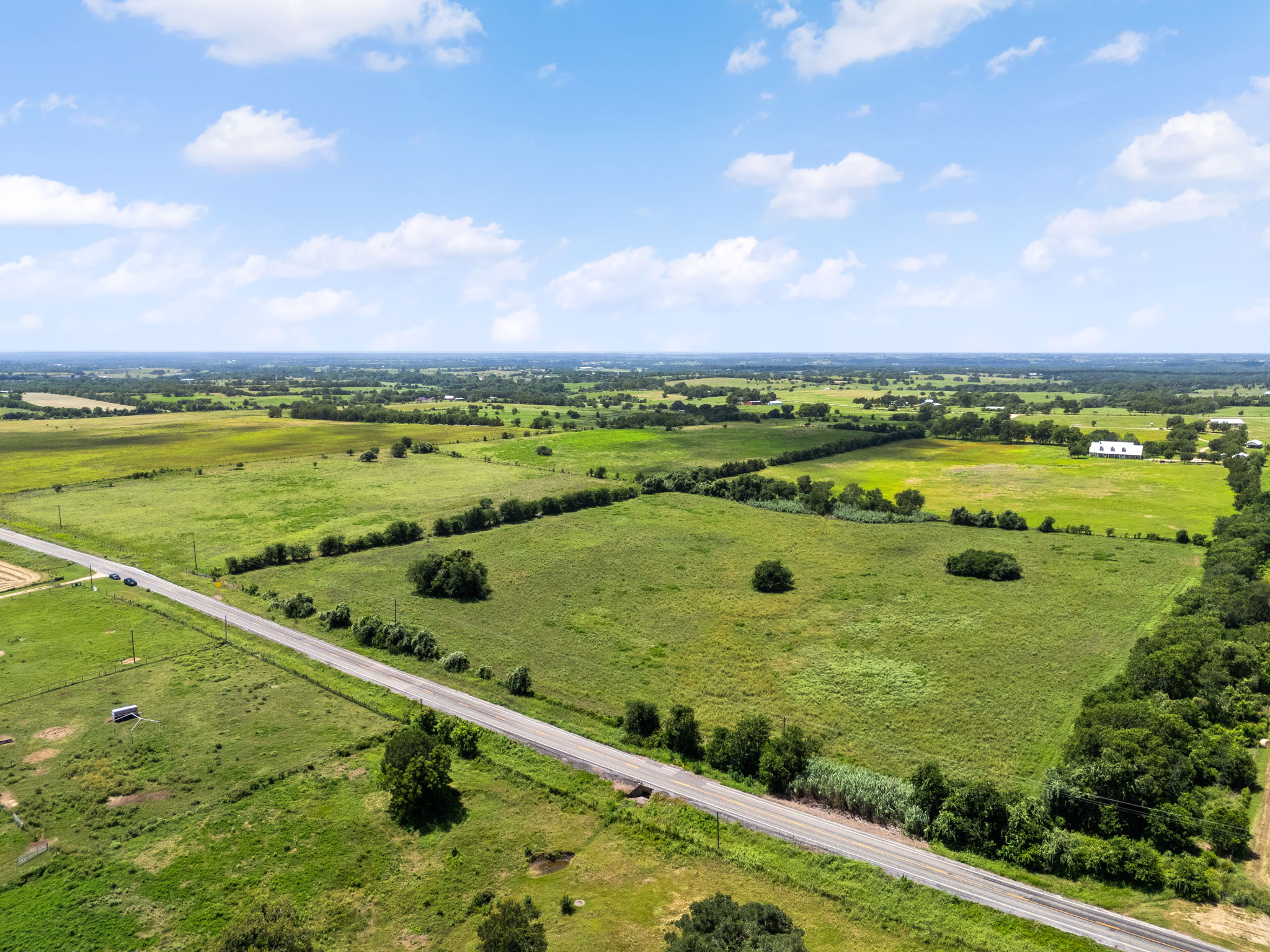 0 Thielemann Road Industry, TX 78944 - Photo 26 of 40 Rolling green pastures define this sprawling acreage, a perfect rural canvas.