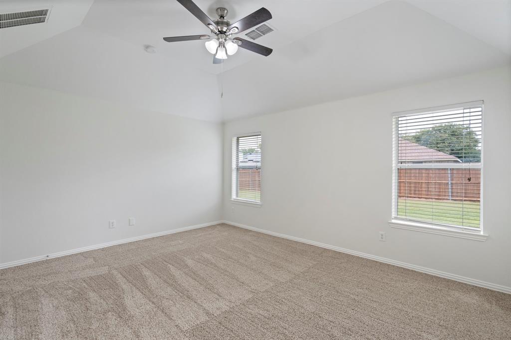 613 Hummingbird Trail Crowley, TX 76036 - Photo 19 of 37 a view of an empty room with a window