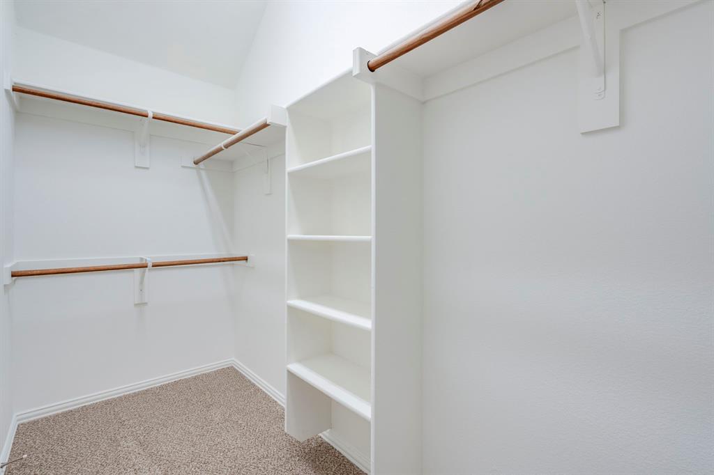613 Hummingbird Trail Crowley, TX 76036 - Photo 22 of 37 a view of an empty walk in closet