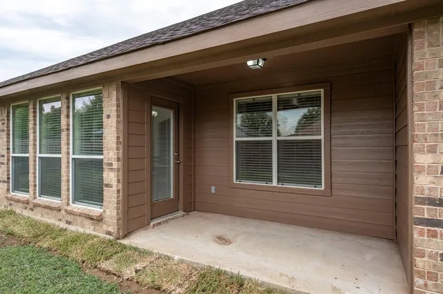 a view of a backyard with a garden
