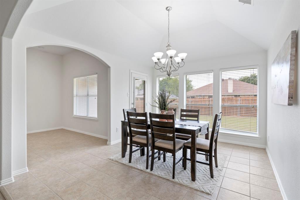 613 Hummingbird Trail Crowley, TX 76036 - Photo 9 of 37 a view of a dining room with furniture and window