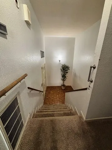 a view of a livingroom with a chandelier