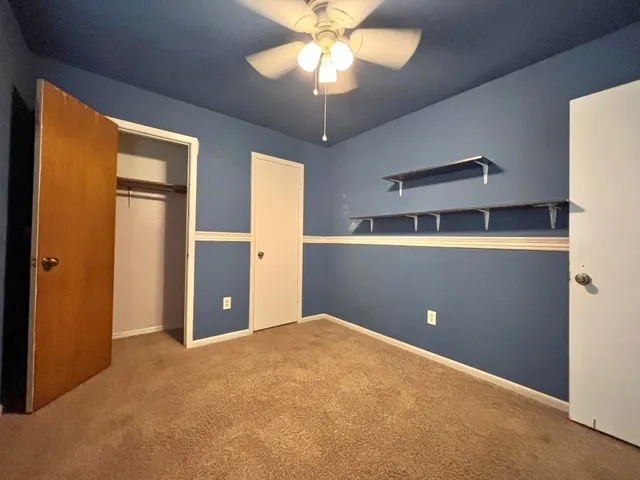 a view of a room with a door