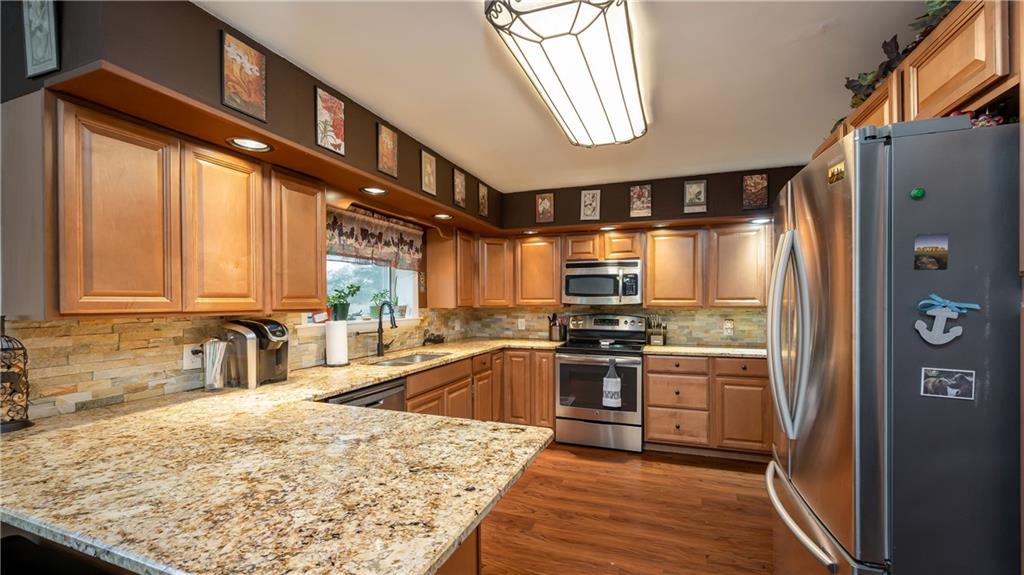 Abundant storage, granite countertops and stainless appliances!