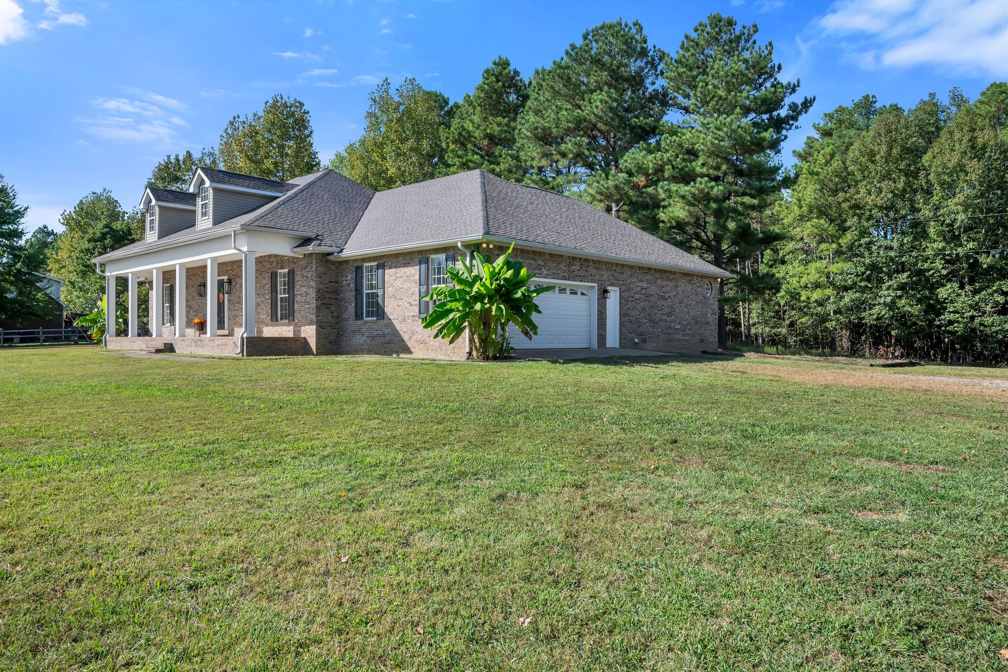 2044 Old Blacktop Road McEwen, TN 37101 - Photo 12 of 45 front view of a house with a yard