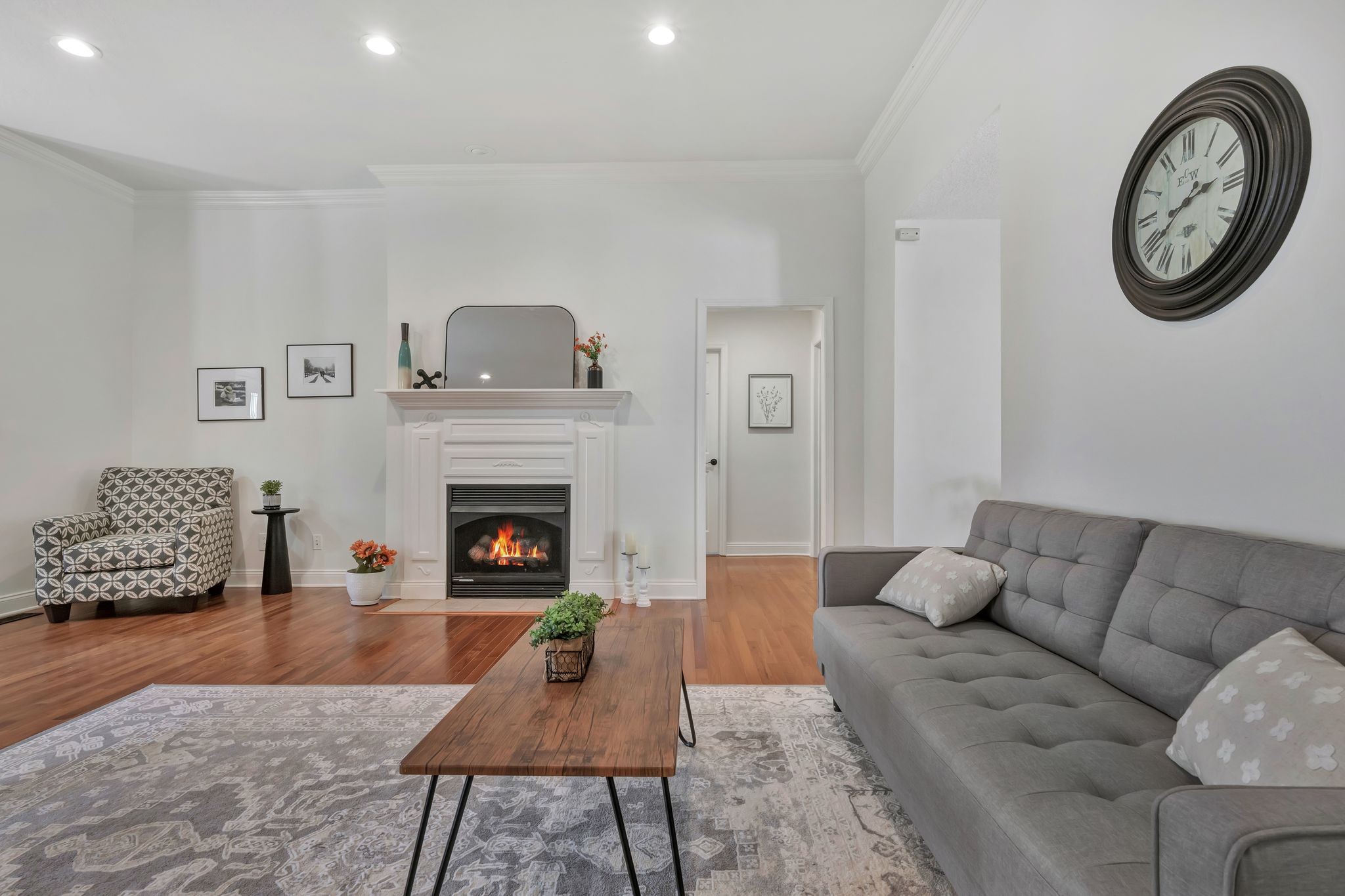 2044 Old Blacktop Road McEwen, TN 37101 - Photo 22 of 45 a living room with furniture a rug and a fireplace