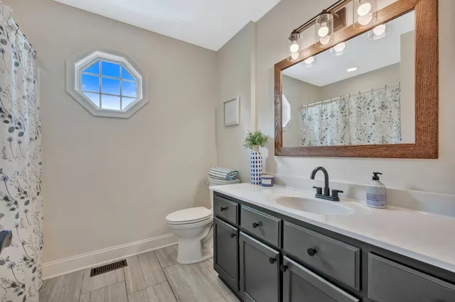 a view of a room with racks on the wall