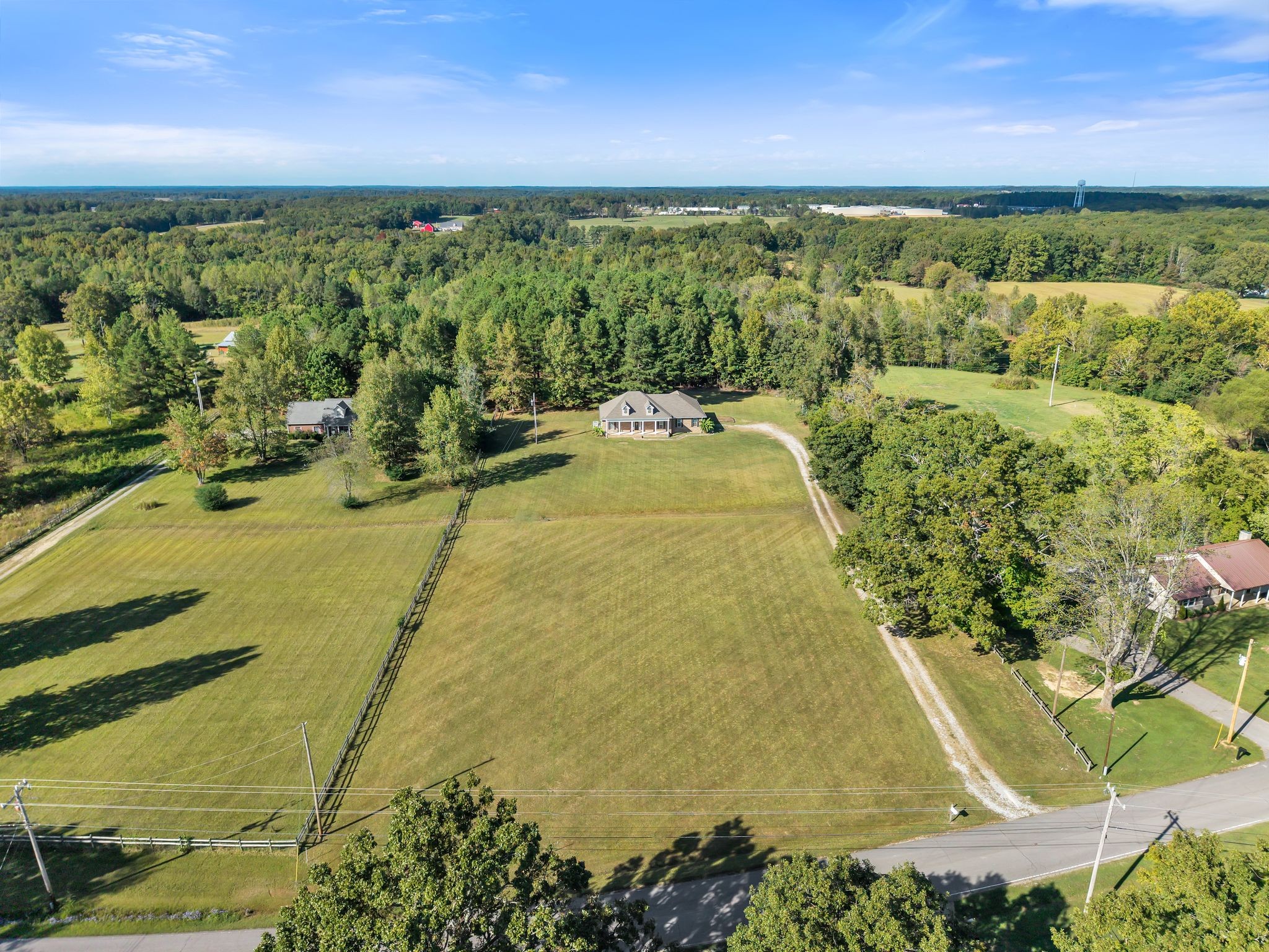 2044 Old Blacktop Road McEwen, TN 37101 - Photo 8 of 45 a view of a swimming pool with a yard