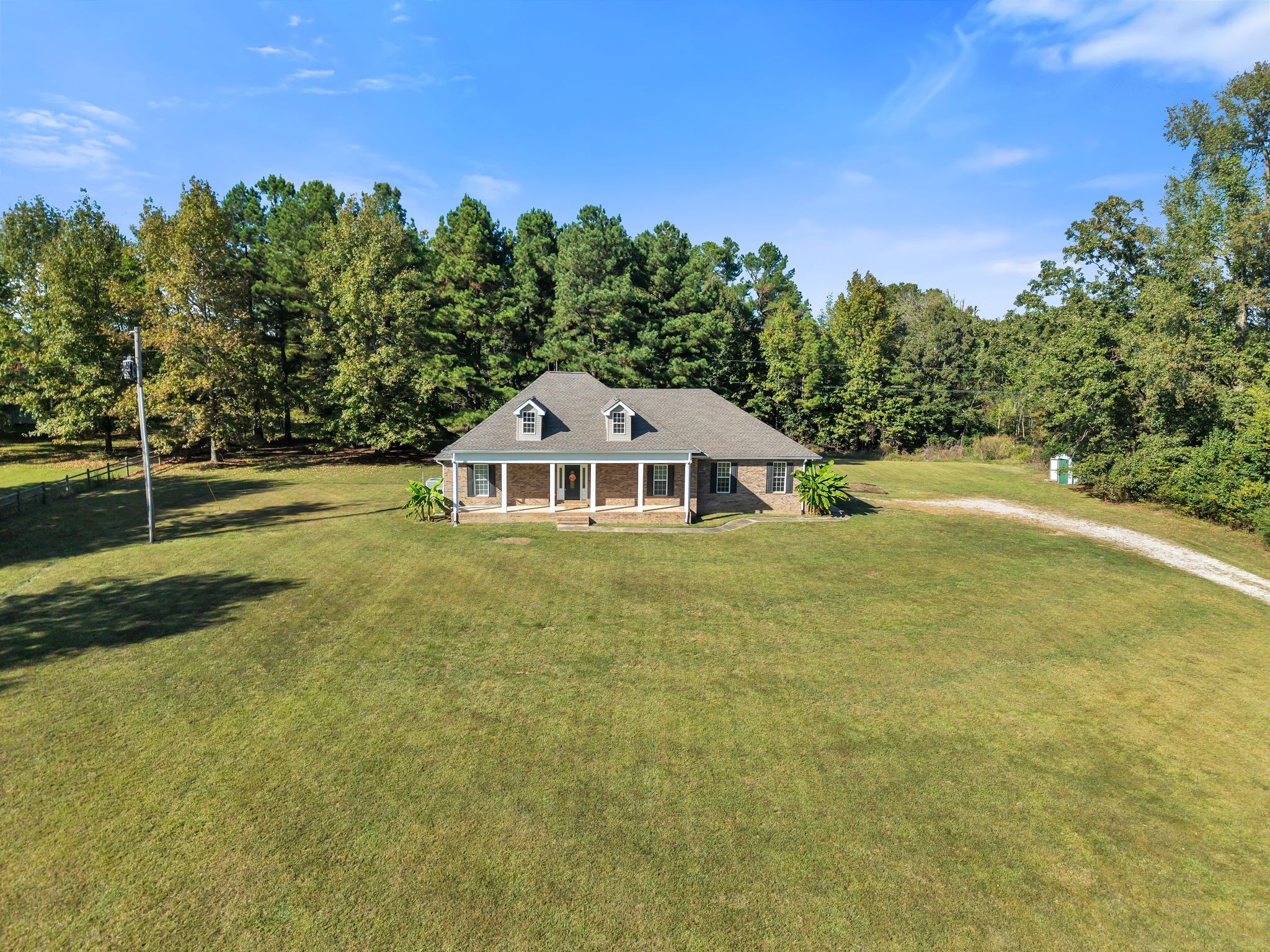 2044 Old Blacktop Road McEwen, TN 37101 - Photo 9 of 45 a front view of a house with a yard