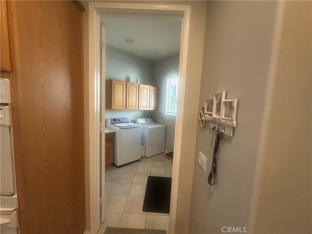 1185 Lantana Road Beaumont, CA 92223 - Photo 20 of 36 a bathroom with a sink a toilet and shower