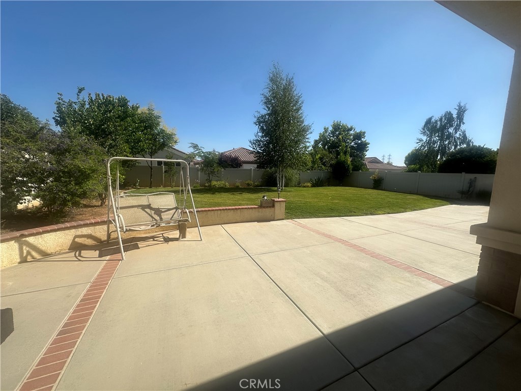 1185 Lantana Road Beaumont, CA 92223 - Photo 26 of 36 a view of a swimming pool with a patio